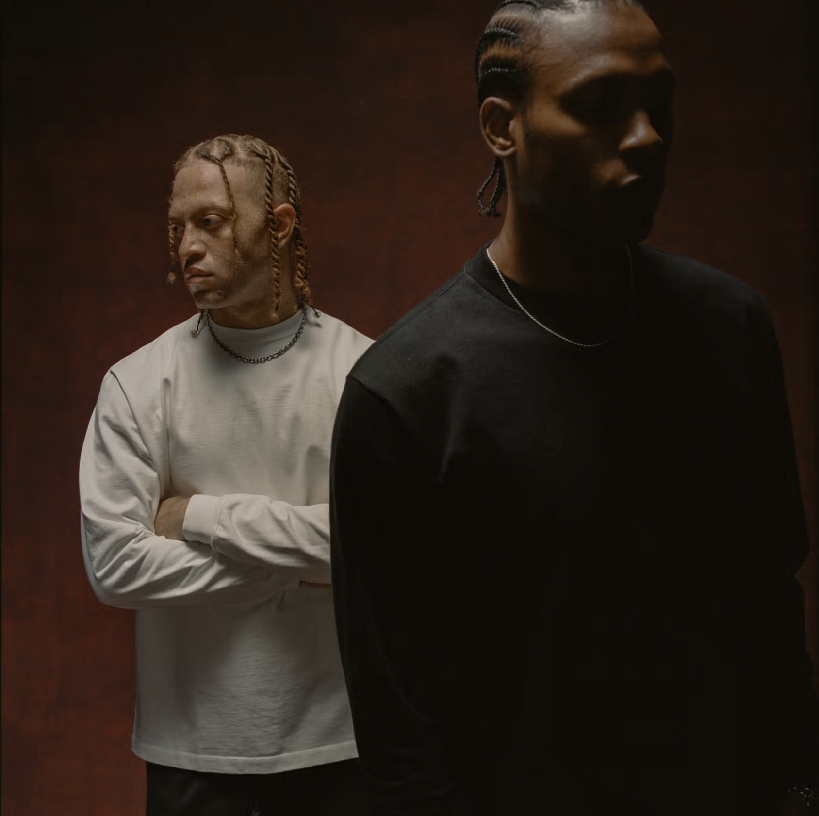 Layered Young Vets portrait with a black T-shirt in front and a white long-sleeve shirt behind